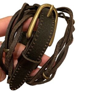 Tarnish brown leather belt in very good condition. Size M